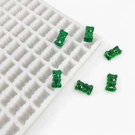 2.3mL gummy bear silicone mold with emerald green sample gummies on a clean white background
