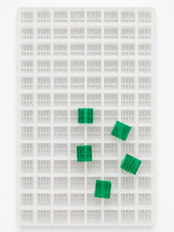 7.5mL 10-piece square breaker gummy mold with 104 cavities and emerald green segmented gummies on a white background